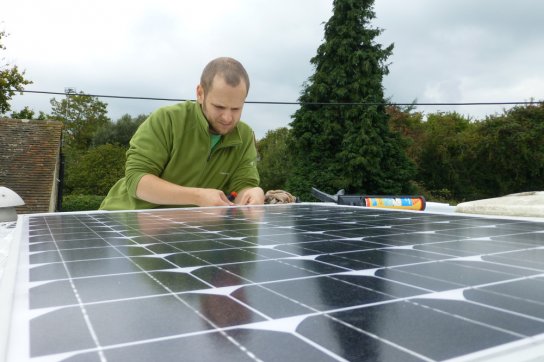 Re-sealing around the solar panel to ensure a watertight seal