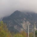 The rain comes in over the mountains